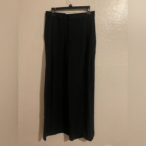 Zara black wide leg trousers featuring high-rise tailoring and rear flap pocket